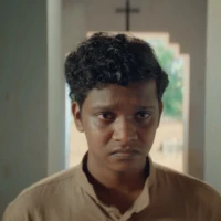 ennu swantham punyalan malayalam movie still featuring supporting young actor in malayalam karthik vishnu