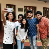 supporting young actor in malayalam karthik vishnu tovino thomas chethan jayalal nandhana varma and arun paul guppy gang in guppy movie re release day photograph