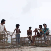 karthik-vishnu-young-supporting-actor-male-in-malayalam-guppy-malayalam-movie-still-guppy-gang-john-paul-george